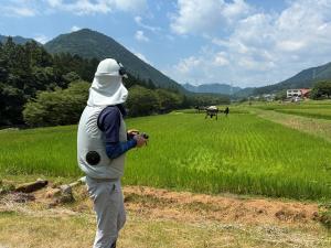 ドローンによる委託防除の様子